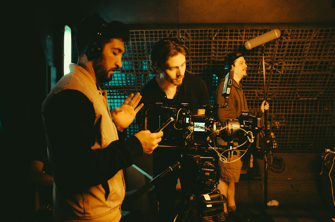 filmmaker using smartphone on set